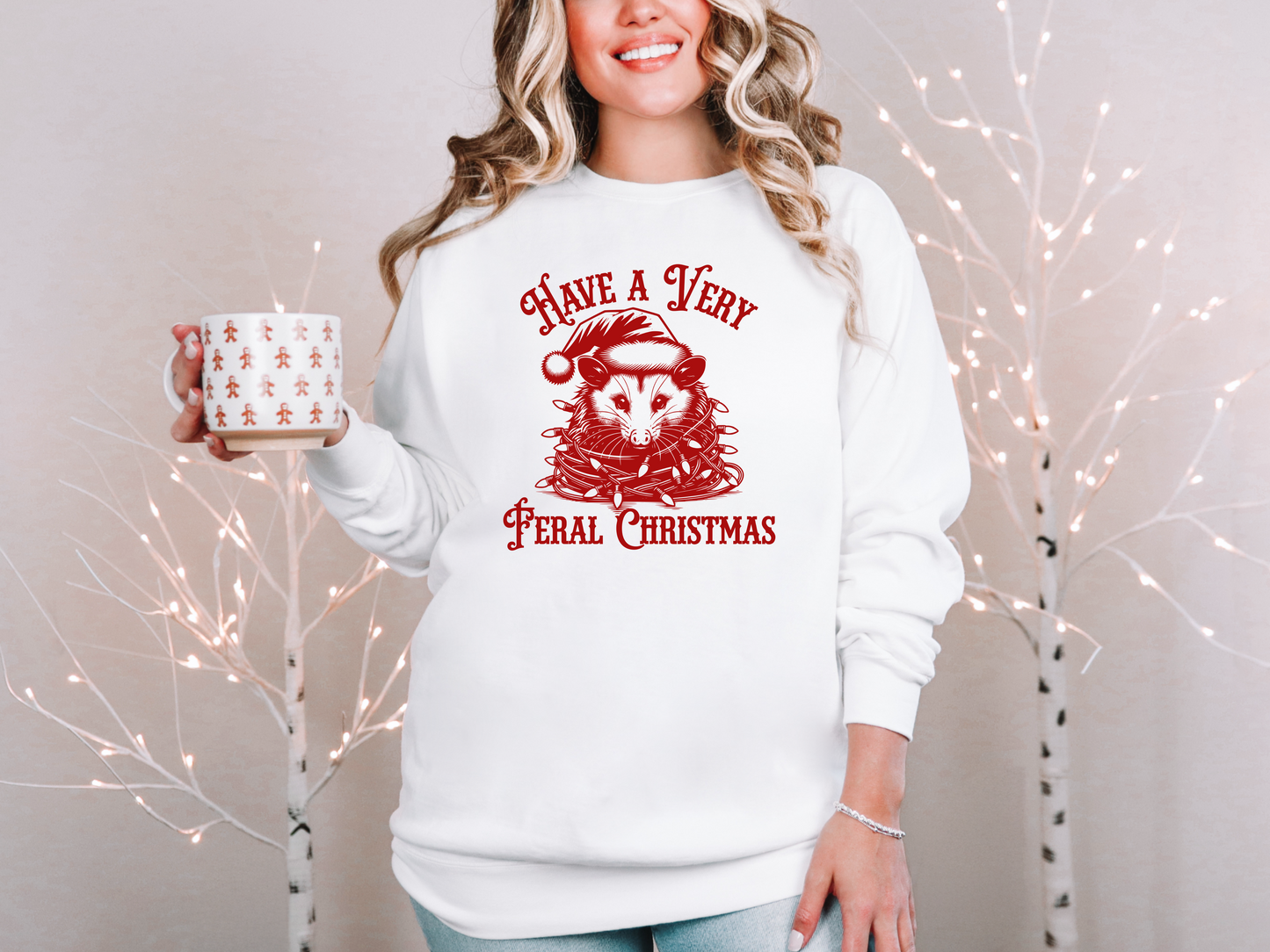 a woman holding a coffee mug and a christmas sweater