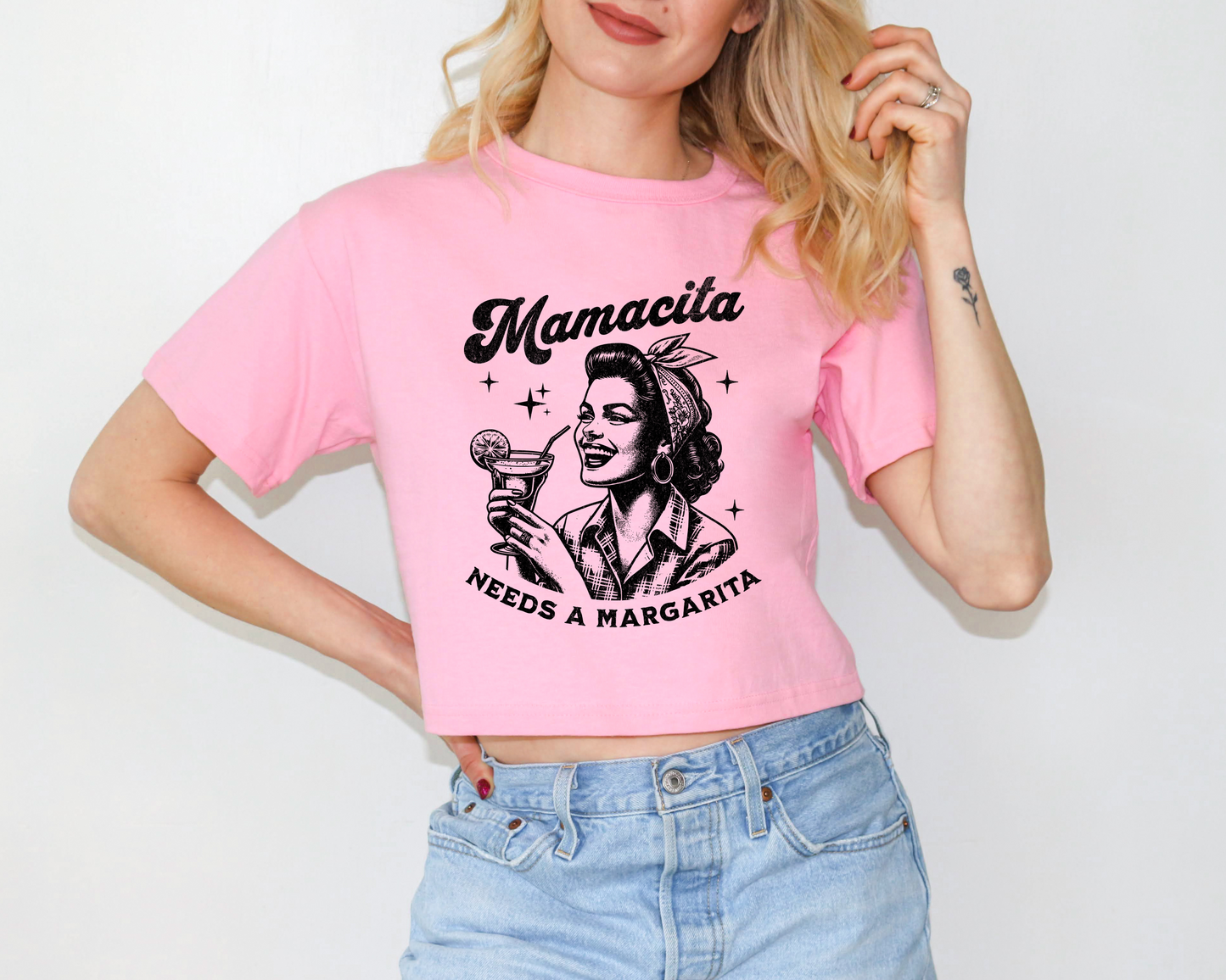 a woman in a pink shirt is posing for a picture