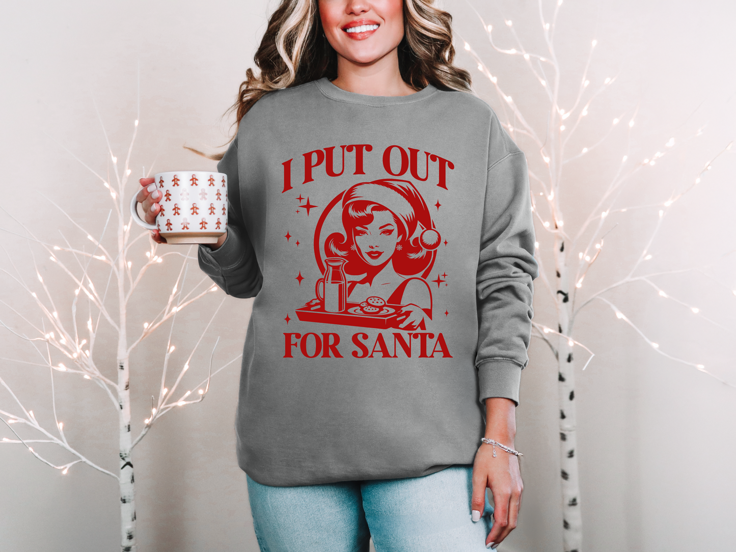 a woman is holding a coffee mug and smiling