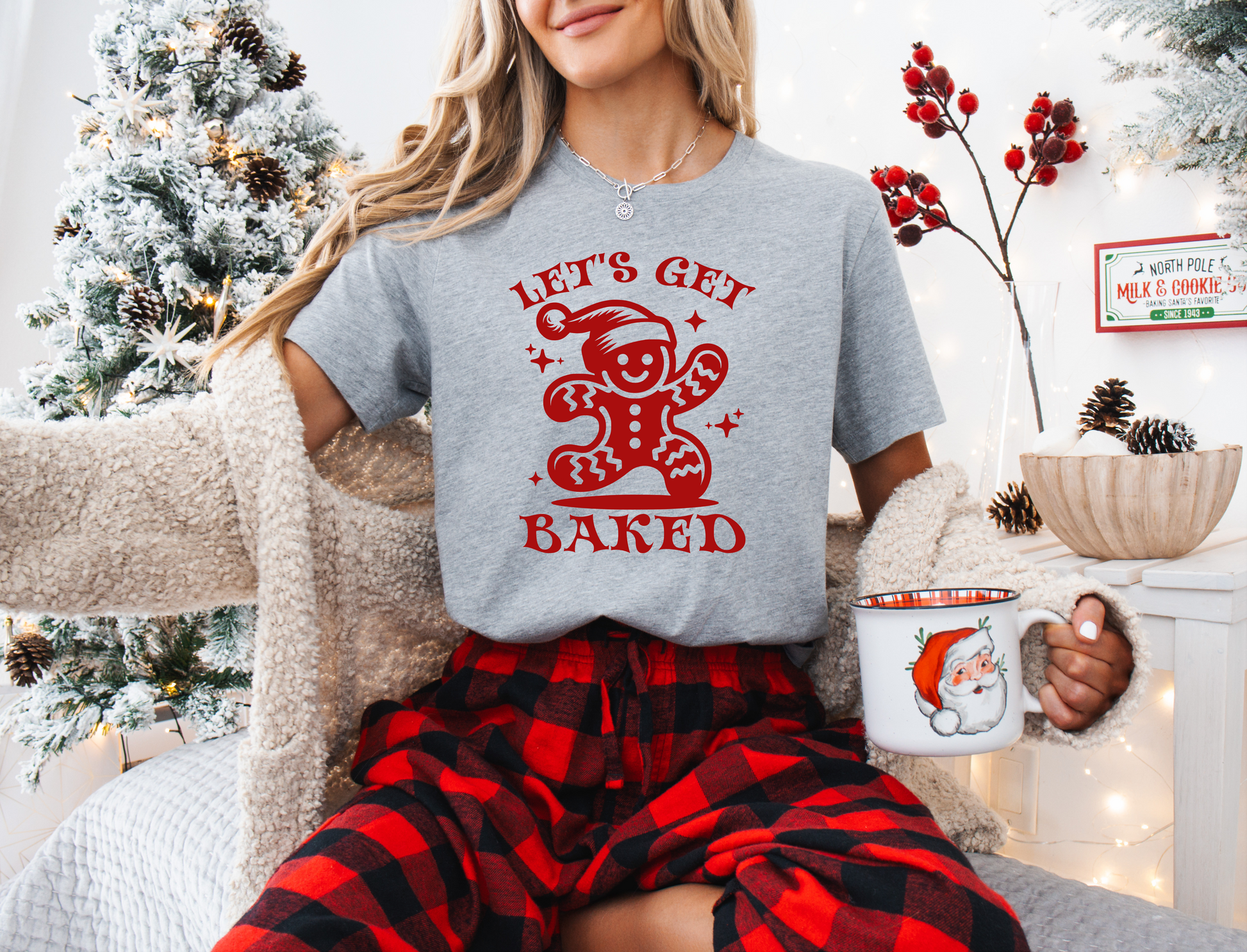 a woman sitting in a chair holding a mug