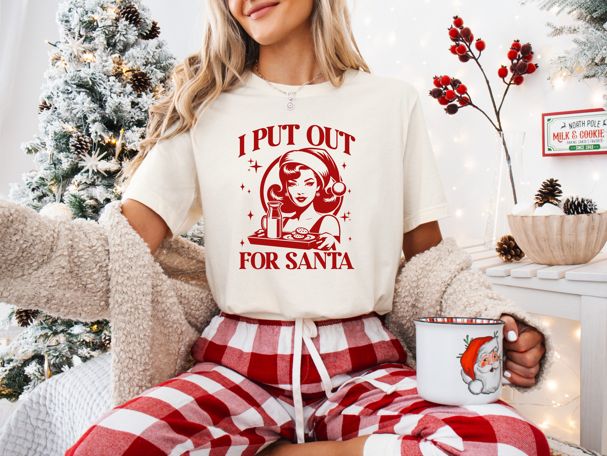 a woman sitting on a couch holding a coffee mug