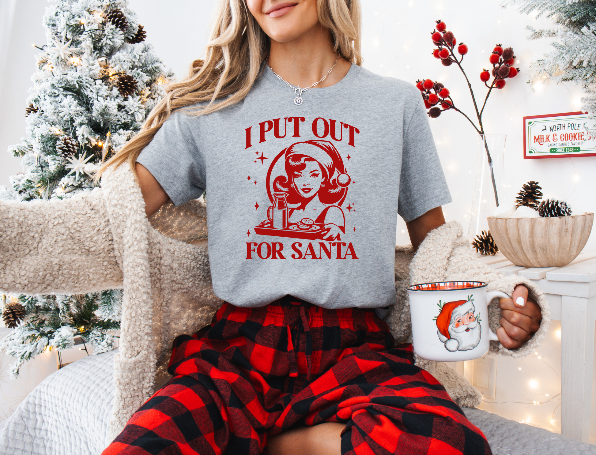 a woman sitting in a chair holding a mug