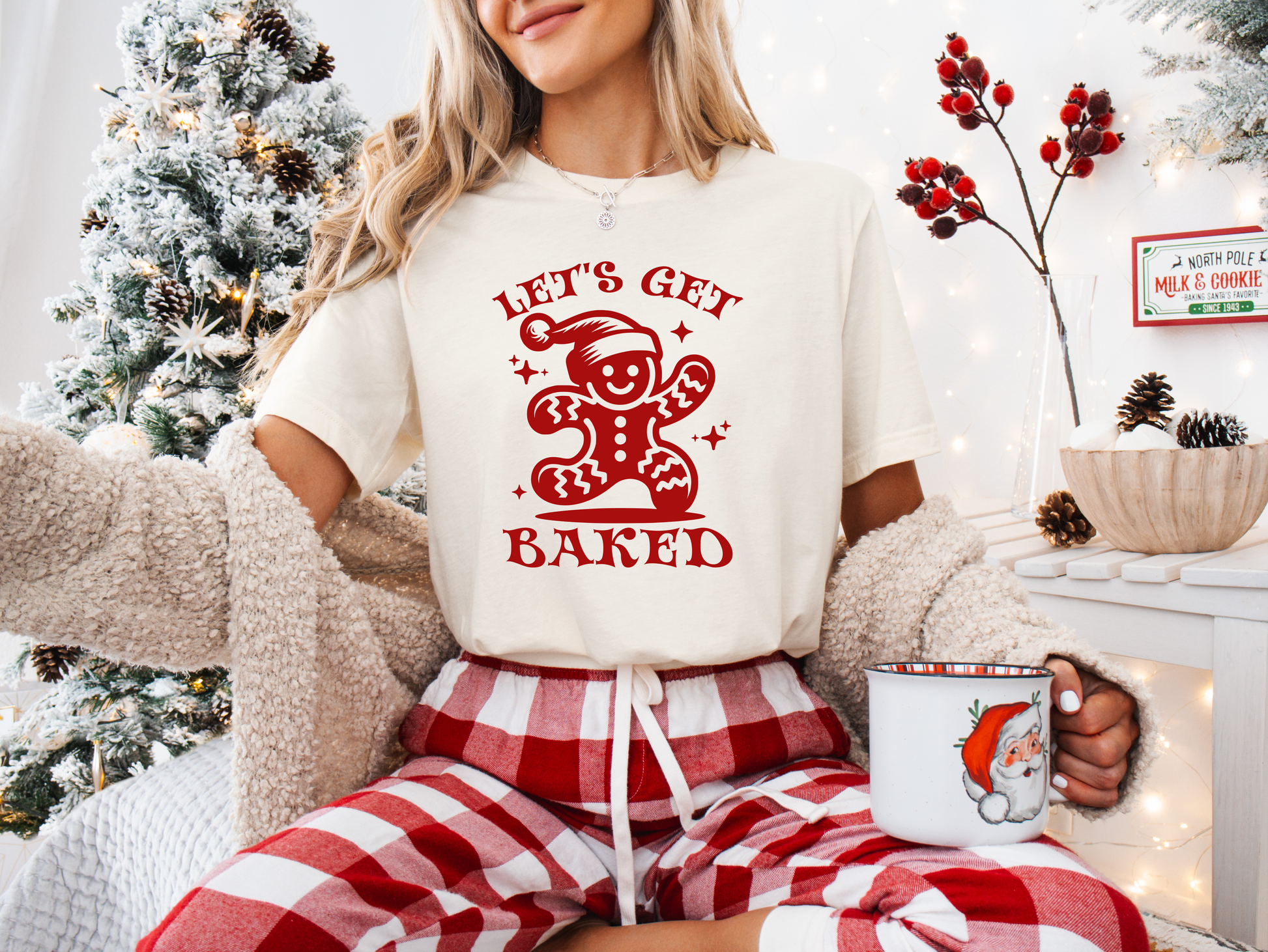 a woman sitting on a couch holding a mug