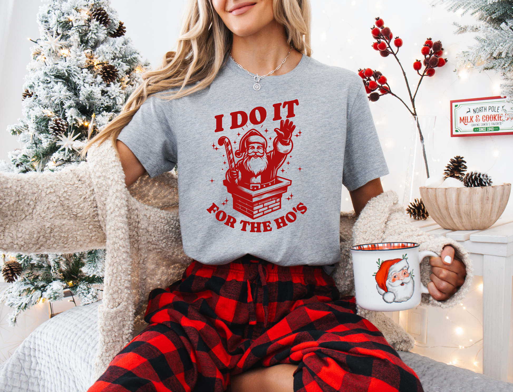 a woman sitting in a chair holding a mug